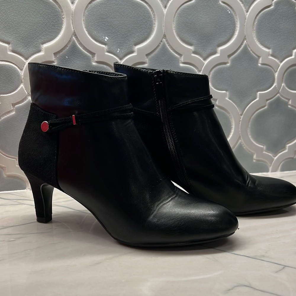 Black ankle boot with 2 1/2 inch heel.